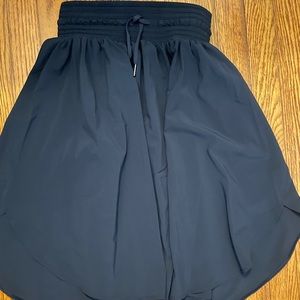 Never worn Lululemon navy blue skirt size 4